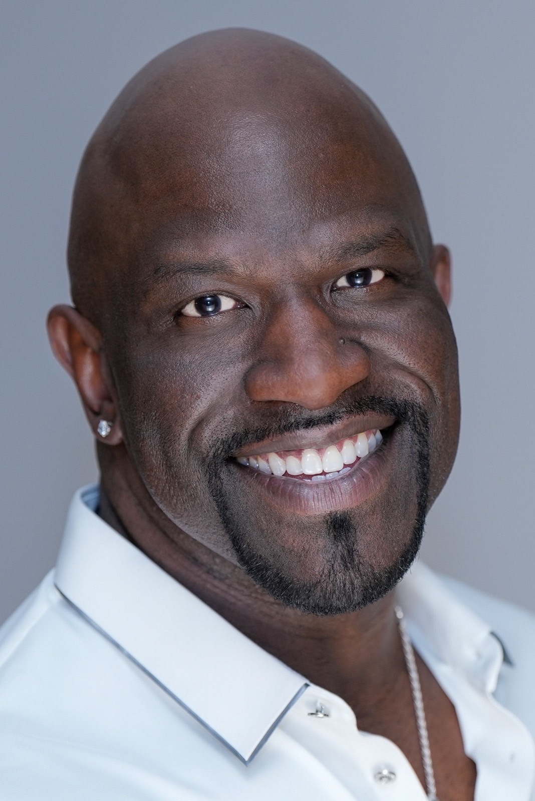 Commercial actor headshot on a light grey backdrop in Las Vegas